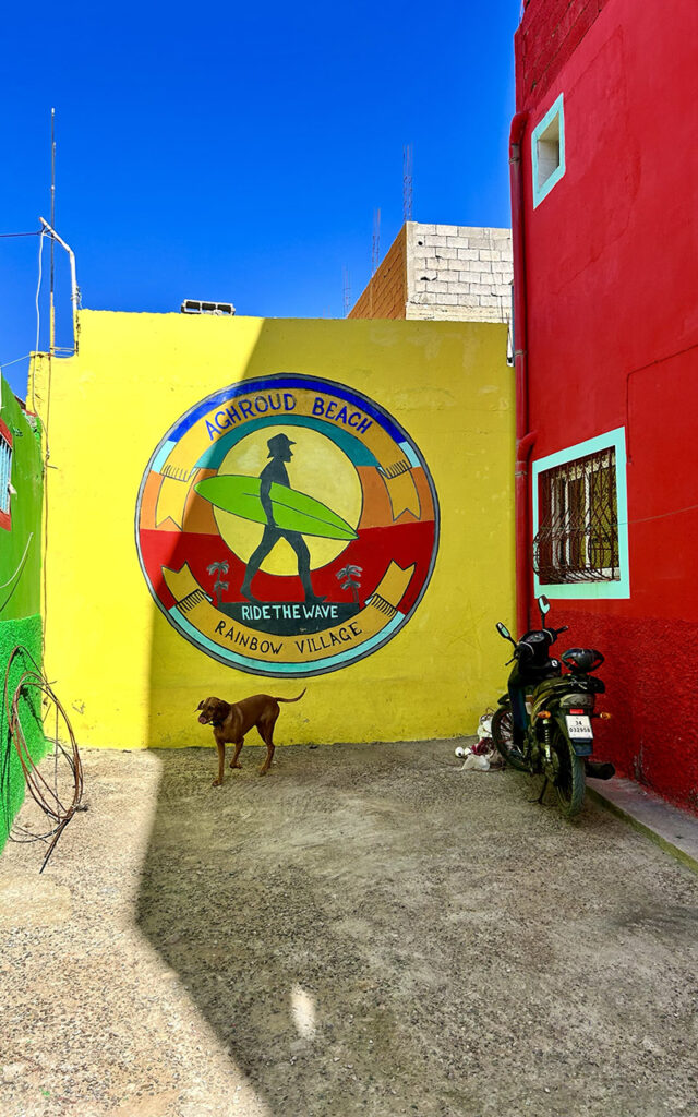 Artistic murals and colorful exterior walls in the hidden gem village of Aghroud.