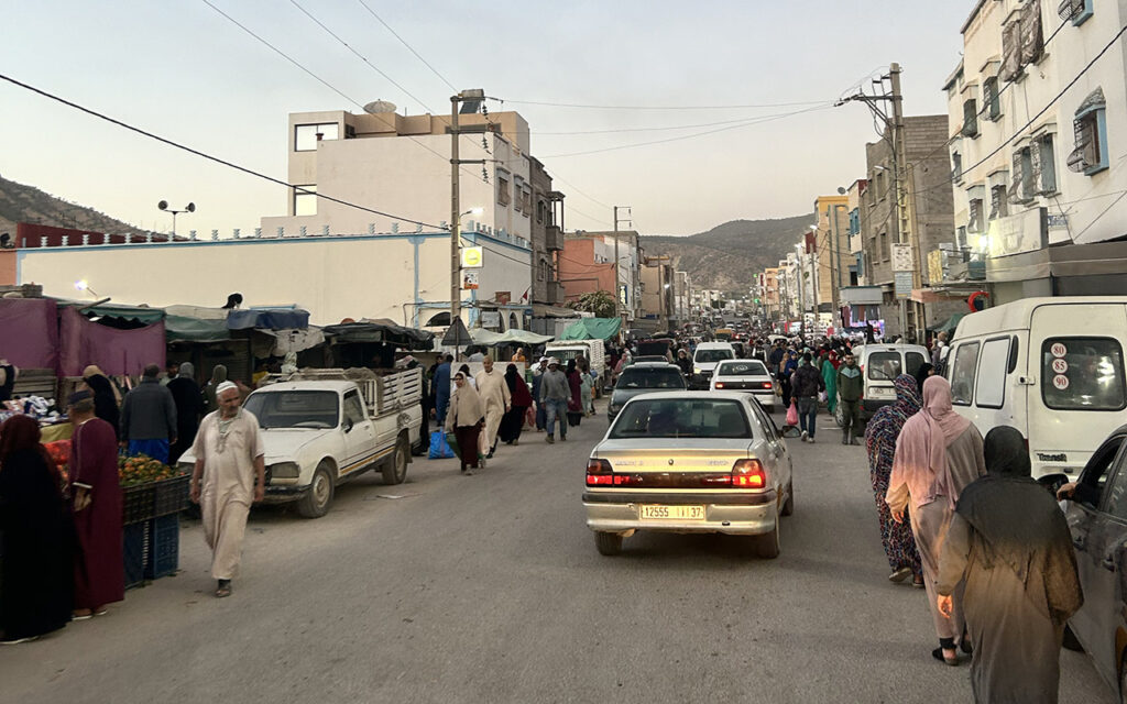 Morocco streets full of people and cars.