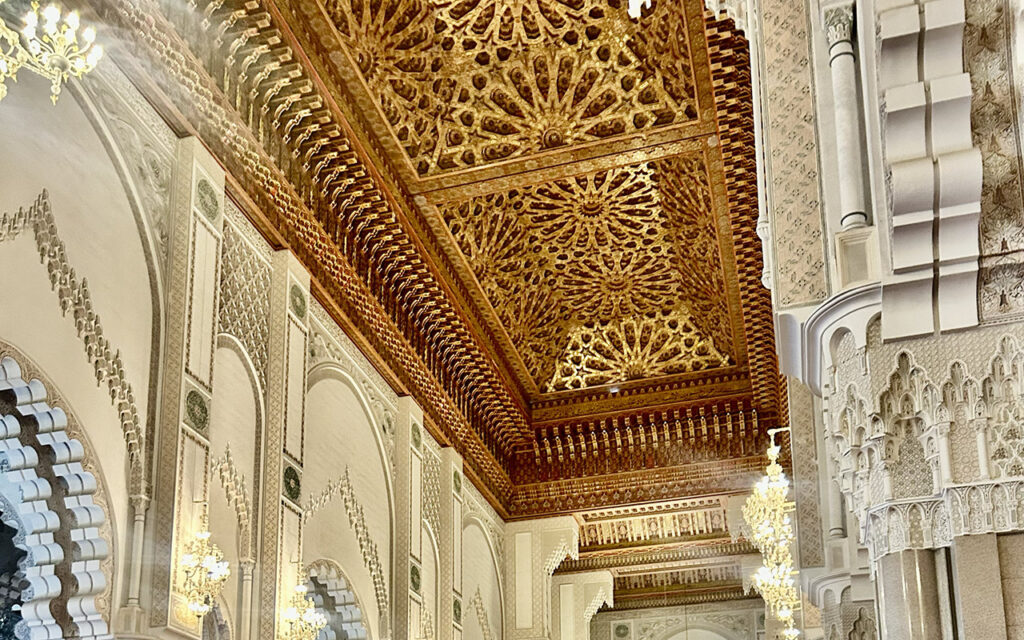 Ornate wooden ceiling inside Hassan II Mosque in Casablanca with intricate carved details