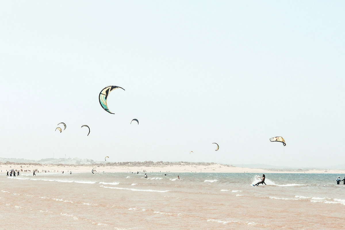 kitesurfing in Morocco Atlantic coast strong wind Essaouira beach wetsuit
