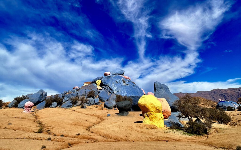 Colorful desert artwork created on natural granite rocks