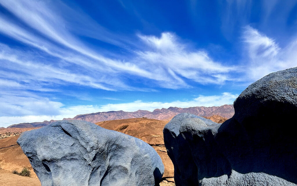 Colorful desert artwork created on natural granite rocks