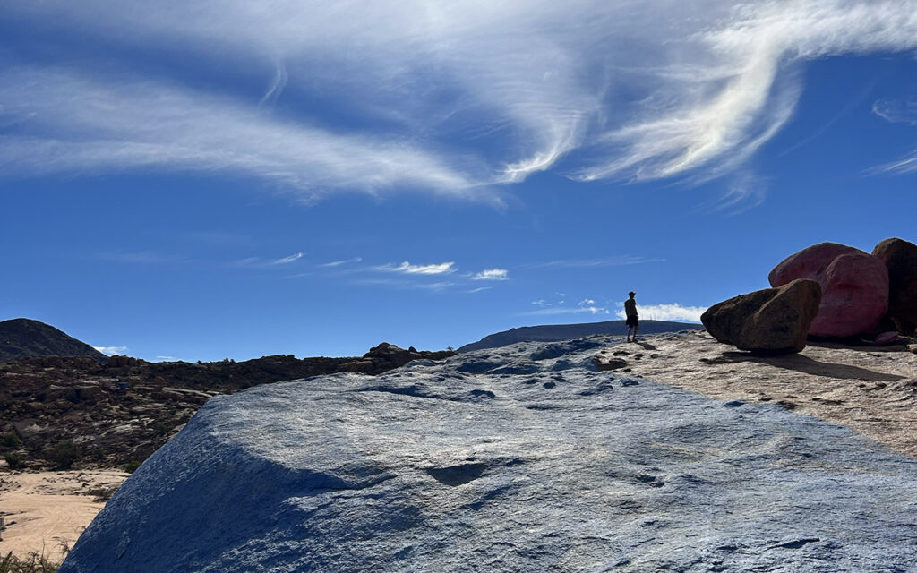 Colorful desert artwork created on natural granite rocks